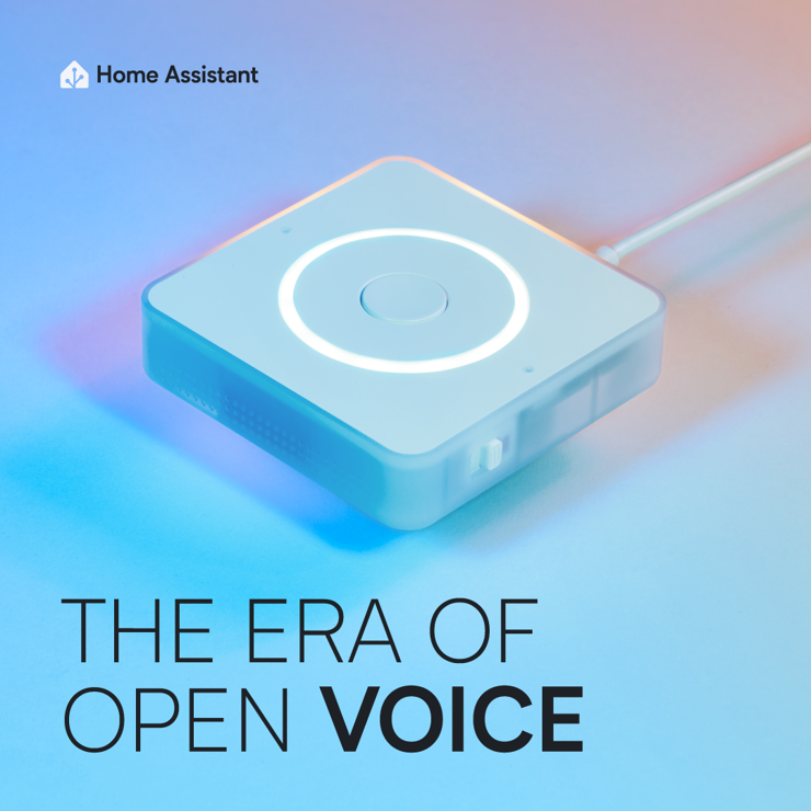 Reveal image of our new hardware, the Home Assistant Voice Preview Edition. The  device is lit up in the blue and pink lighting used for the photoshoot, with the LED ring on top lit in white. At the bottom of the image text reads:
The Era of Open Voice

Our Home Assistant logo is in the top left.